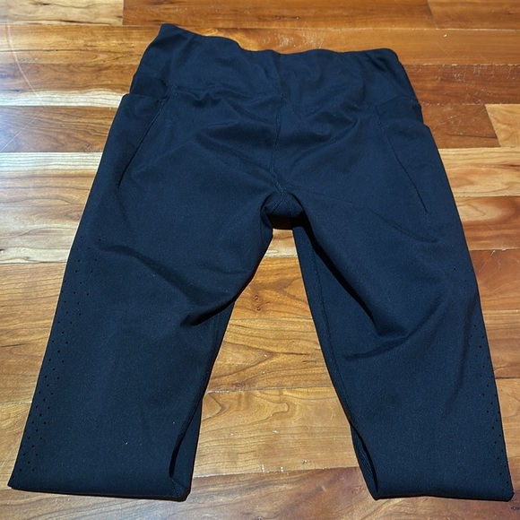 Active life perforated laser cut leggings.Black & Cherry. - Picture 6 of 14